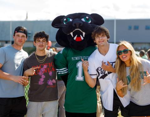 Students posting with Panther Mascot